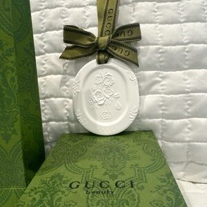 Gucci White Floral Embossed Ornament with Green Ribbon